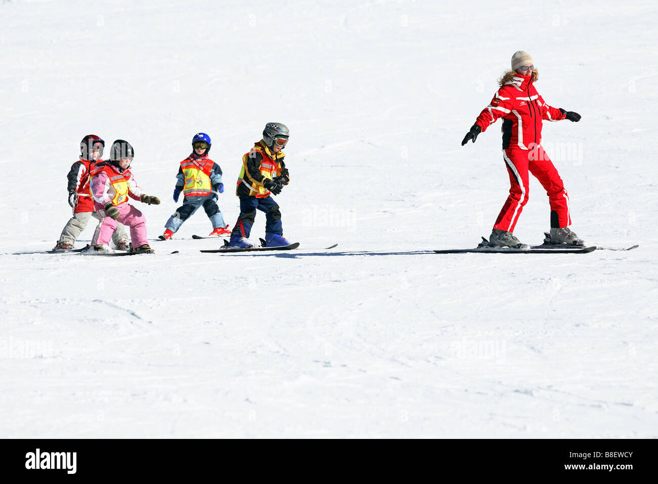 Kids learning skiing Stock Photo