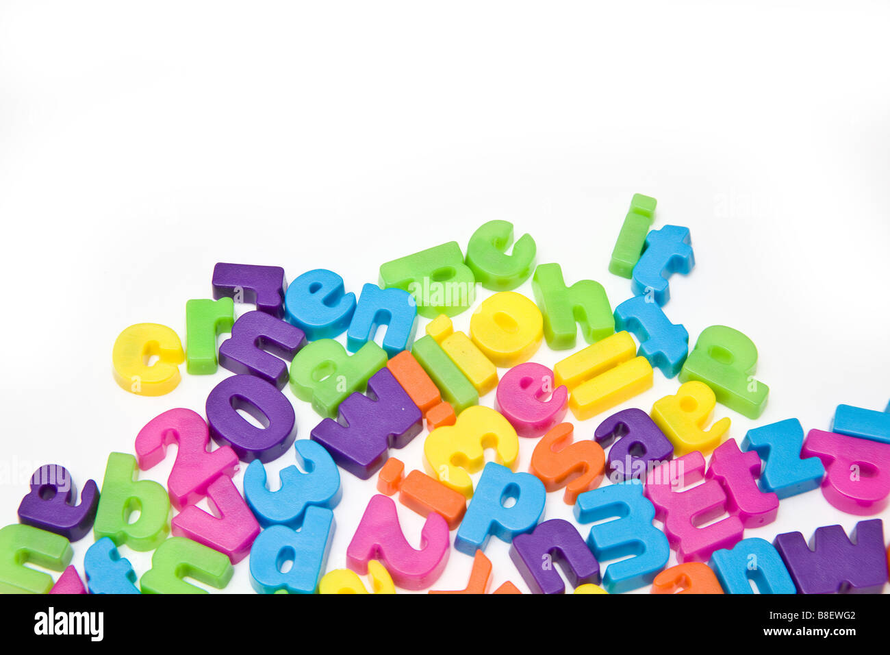 Magnetic letters isolated on a white studio background Stock Photo - Alamy