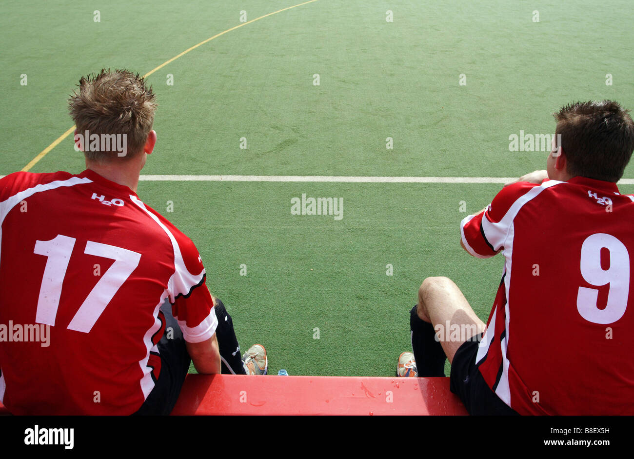 Two Field Hockey Players Sitting On A Bench Ruesselsheim Germany 