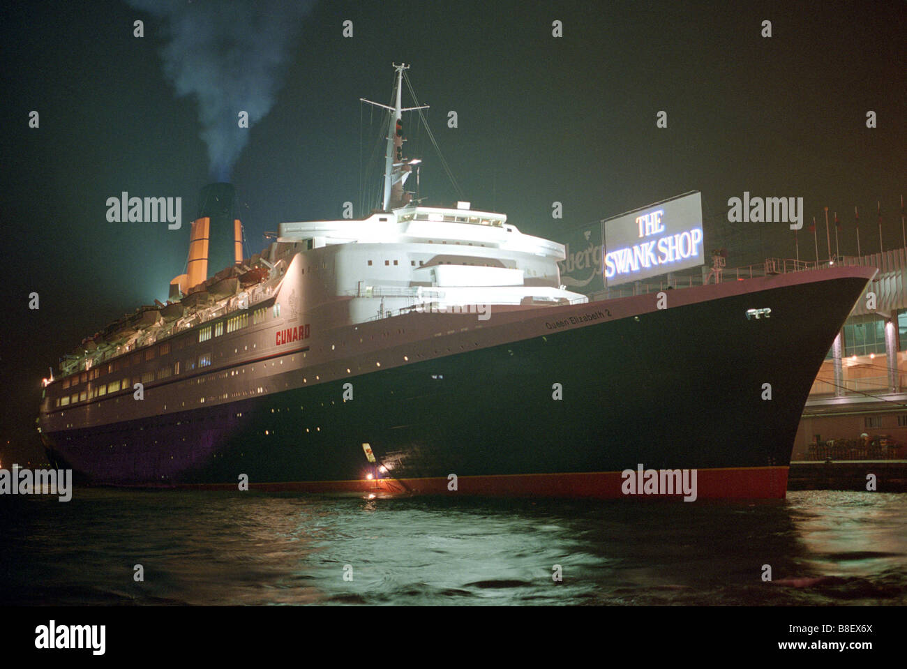 Bow View Of The Cruise Liner Queen Elizabeth 2 Tied Up In Hong Kong At Night Stock Photo Alamy