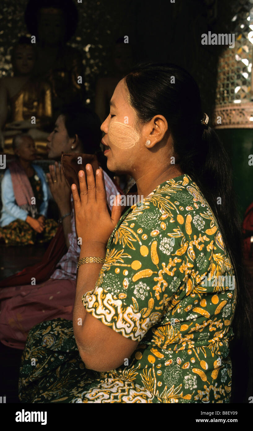 Women praying in the Shwedagon Pagode temple, Yangon, Union of Myanmar Stock Photo