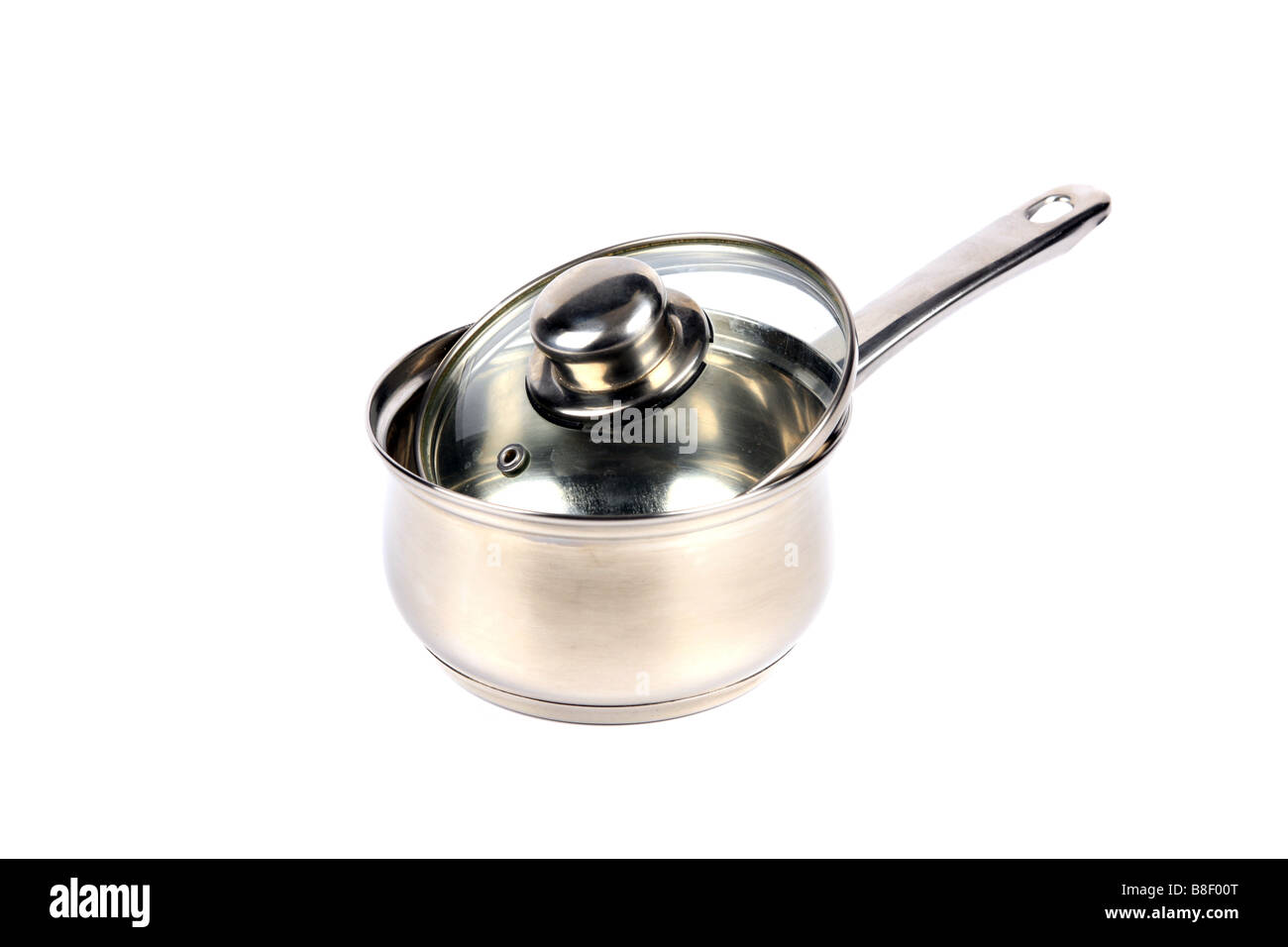Single Stainless Steel Saucepan with glass lid against a white background Stock Photo
