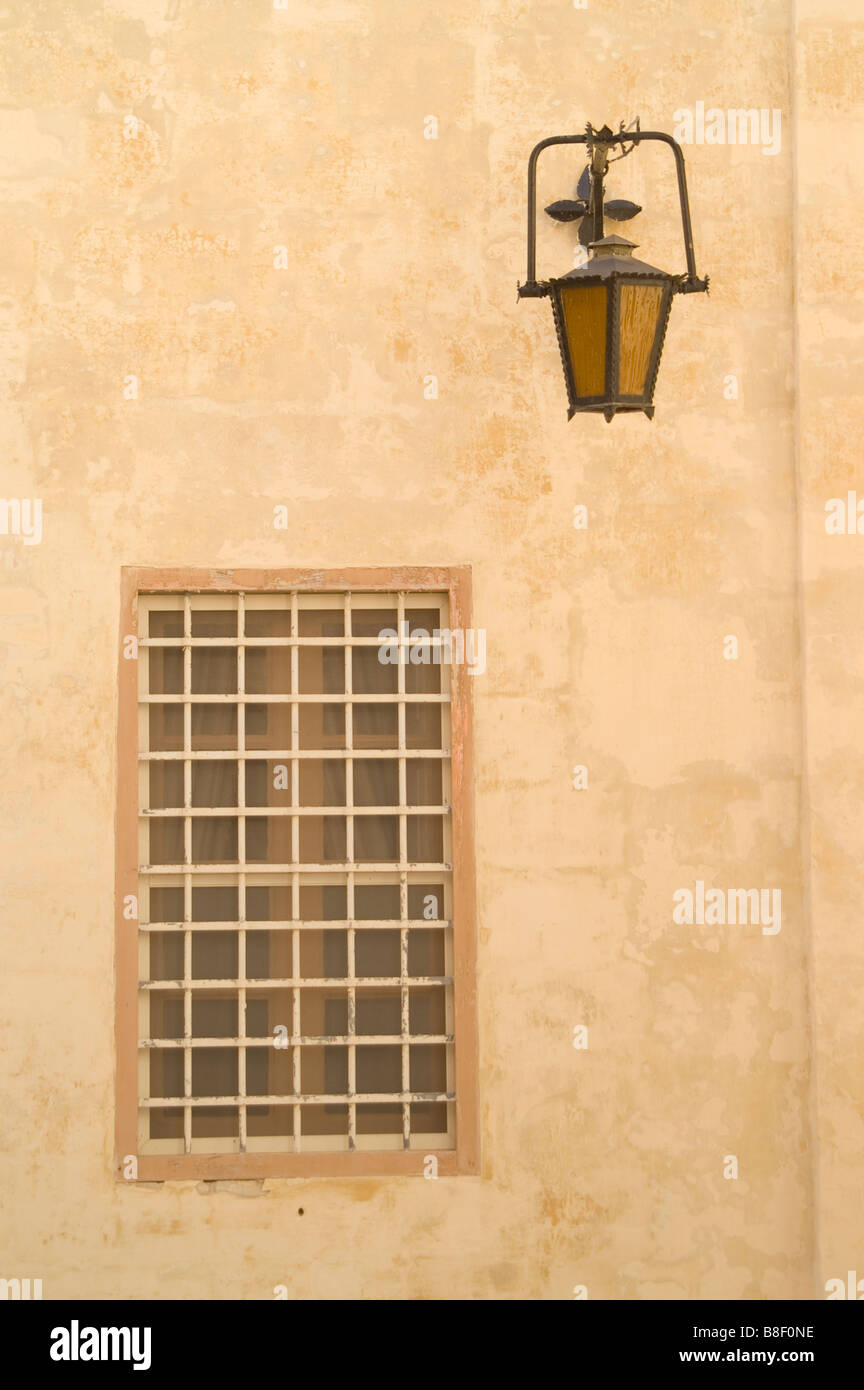 Dclose up detailing old window and lamp in Malta Stock Photo