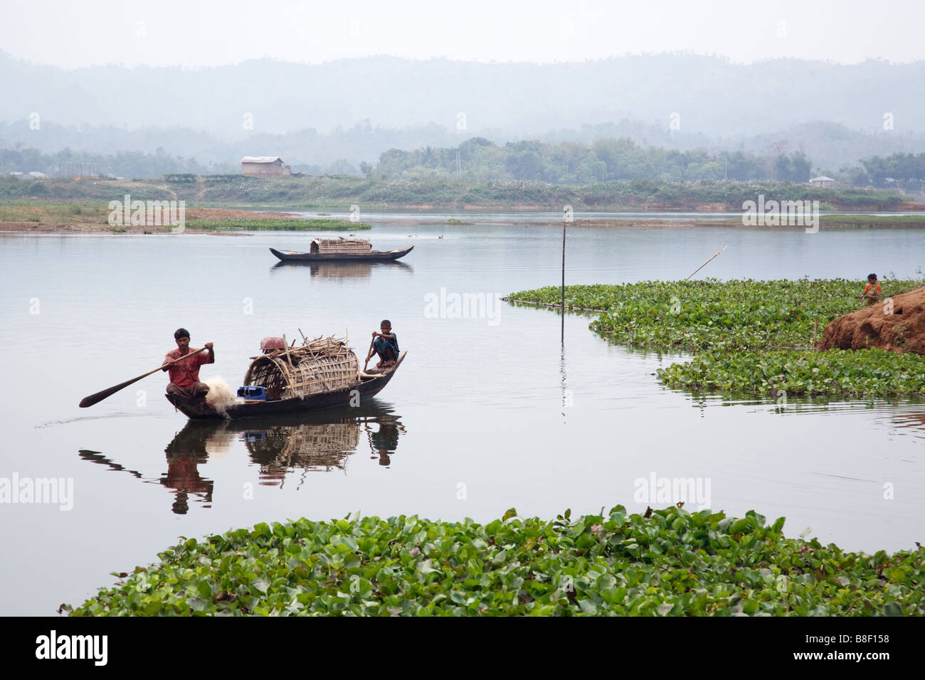 People in a boat on Kaptai Lake in Rangamati, Bangladesh Stock Photo