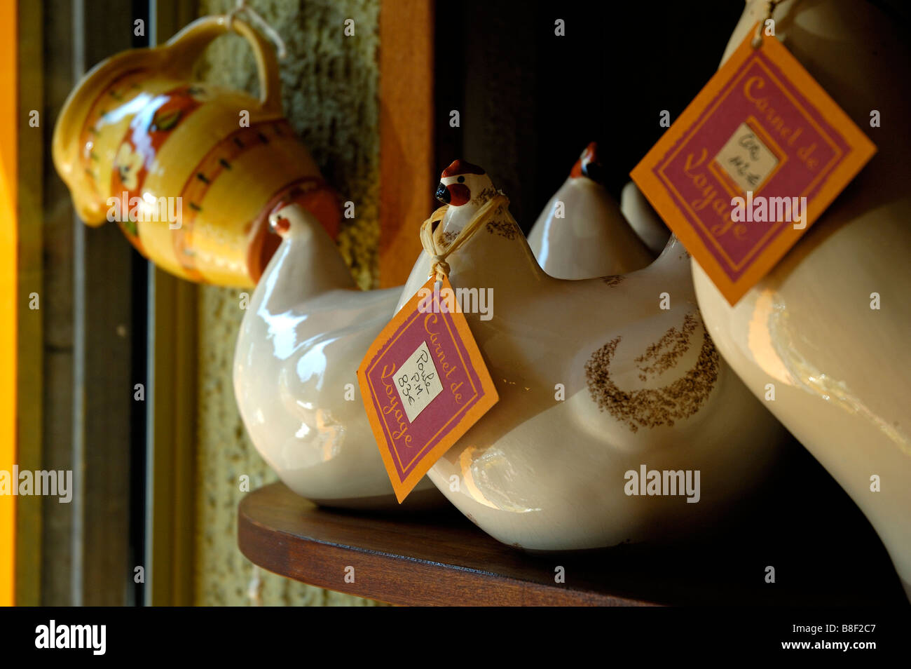 Pottery chickens on display at a shop in Arles, Provence, France Stock Photo