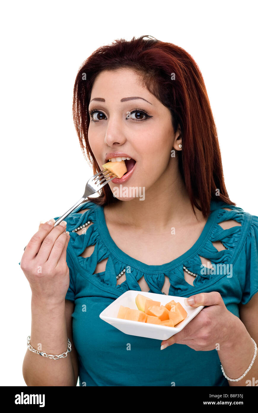woman eating melon Stock Photo Alamy