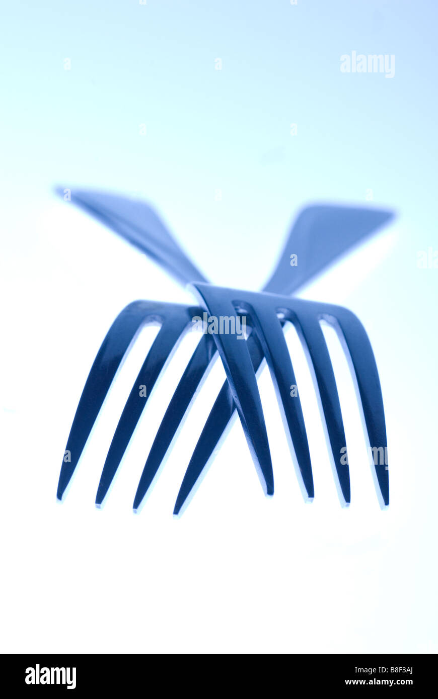 Forks crossed hi-res stock photography and images - Alamy