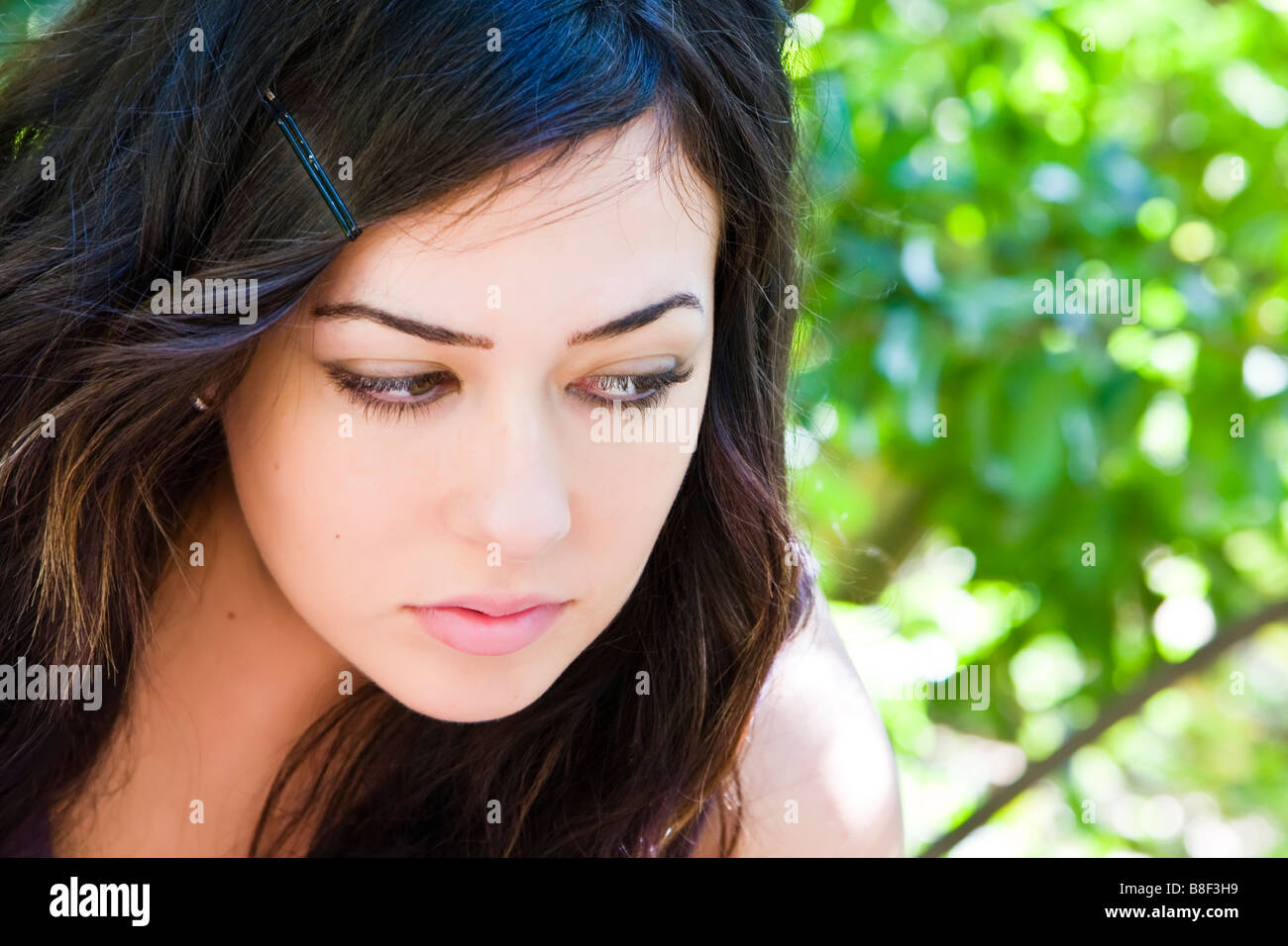 Young woman portrait staring to the right side Stock Photo