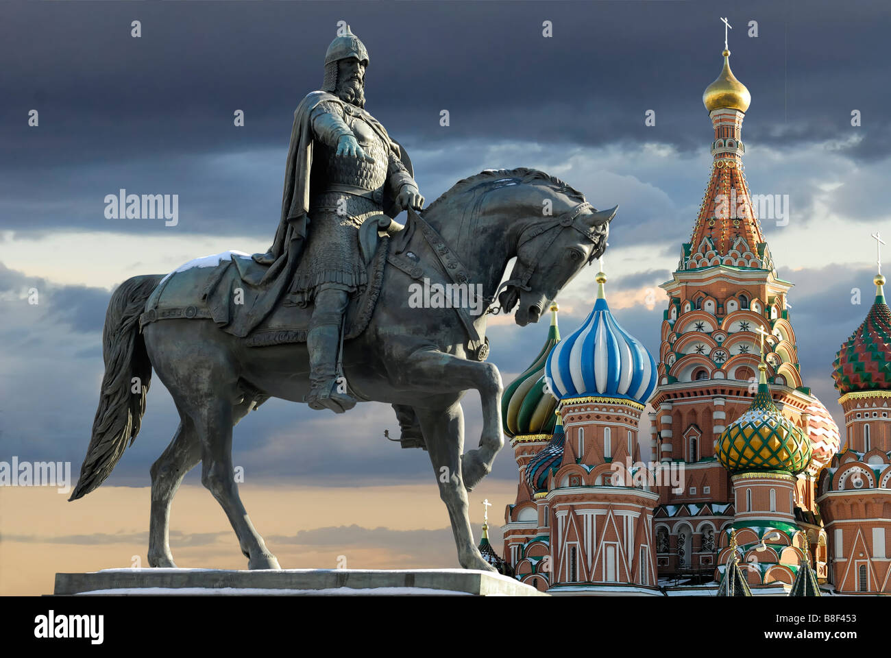 Monument of Yuri Dolgoruki and St Basil cathedral on the dramatic sky background Stock Photo