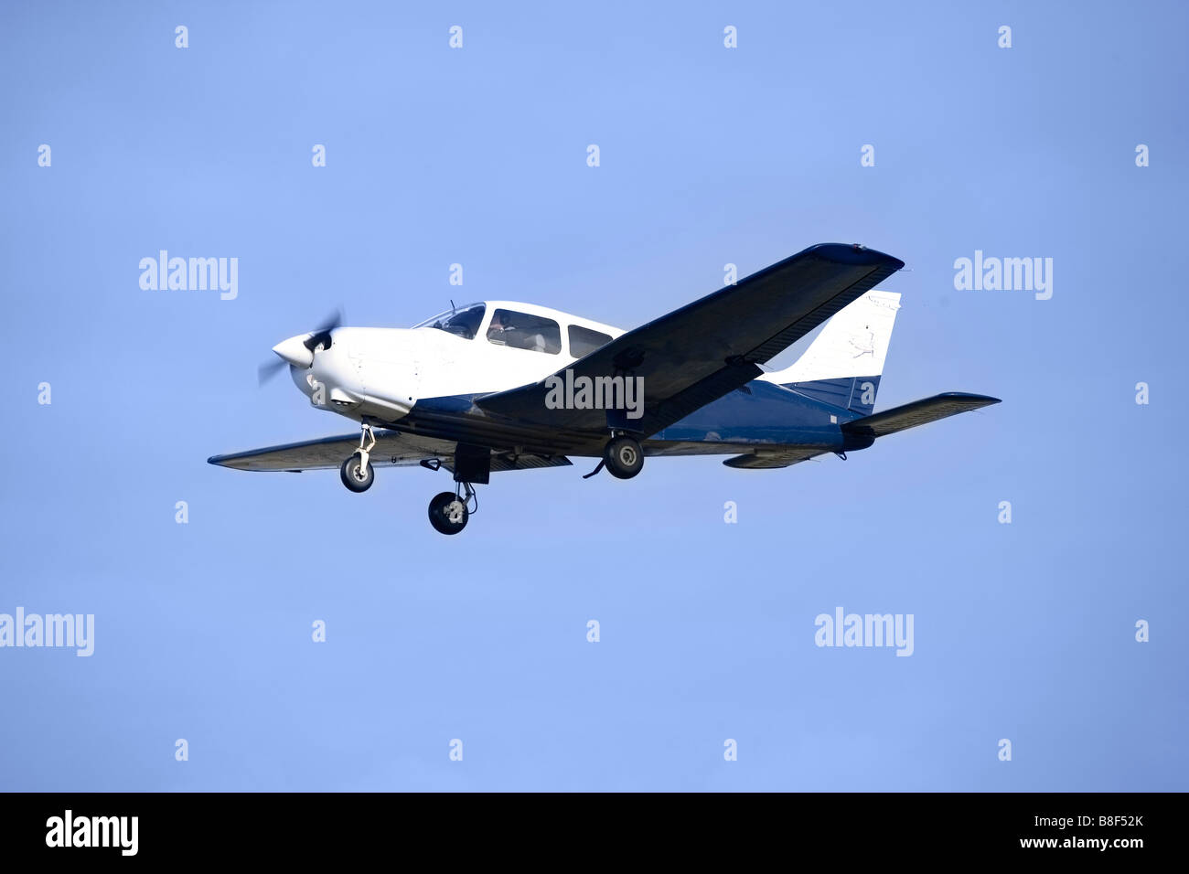 Aircraft Airplane Blue sky Flying In Flight Plane Stock Photo