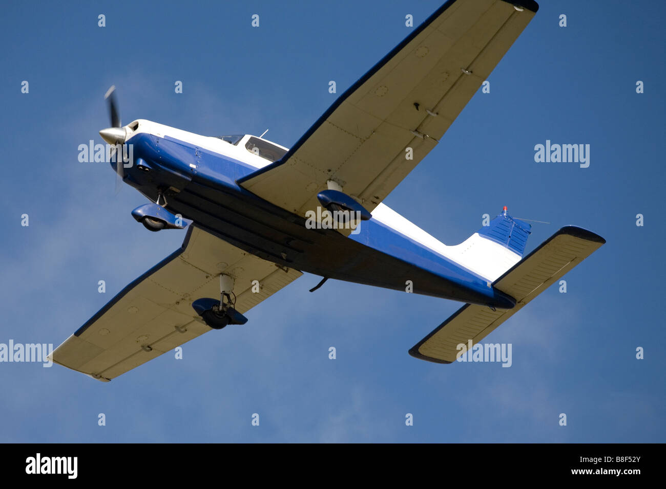 Aircraft Airplane Blue sky Flying In Flight Plane Stock Photo