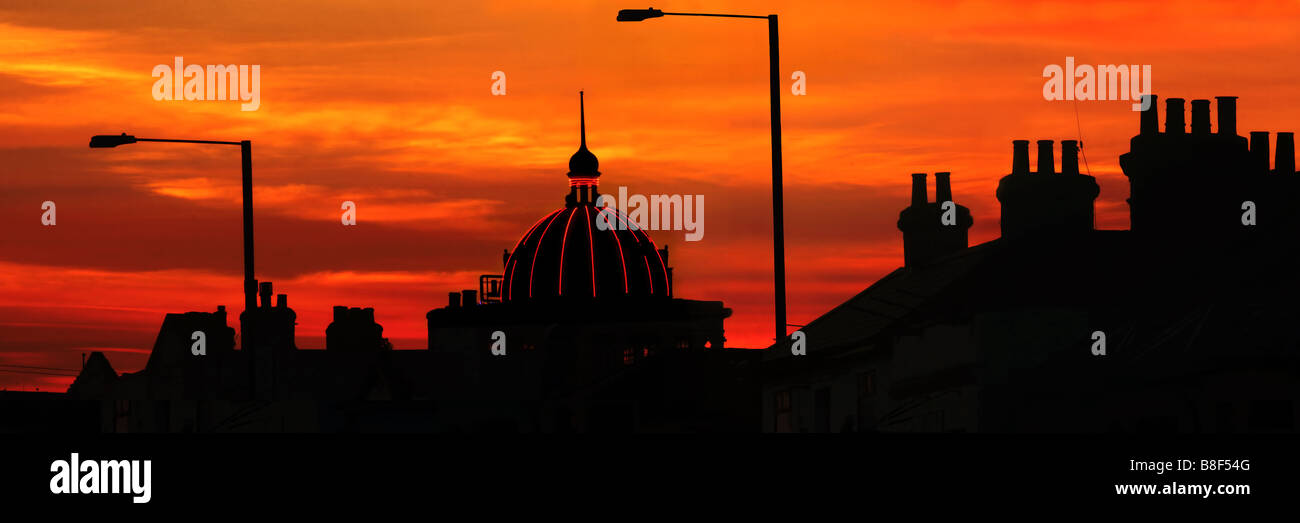 SOUTHEND-ON-SEA, ESSEX, UK - JUNE 08, 2009:  Panorama view of Southend Kursaal at Sunset in silhouette Stock Photo