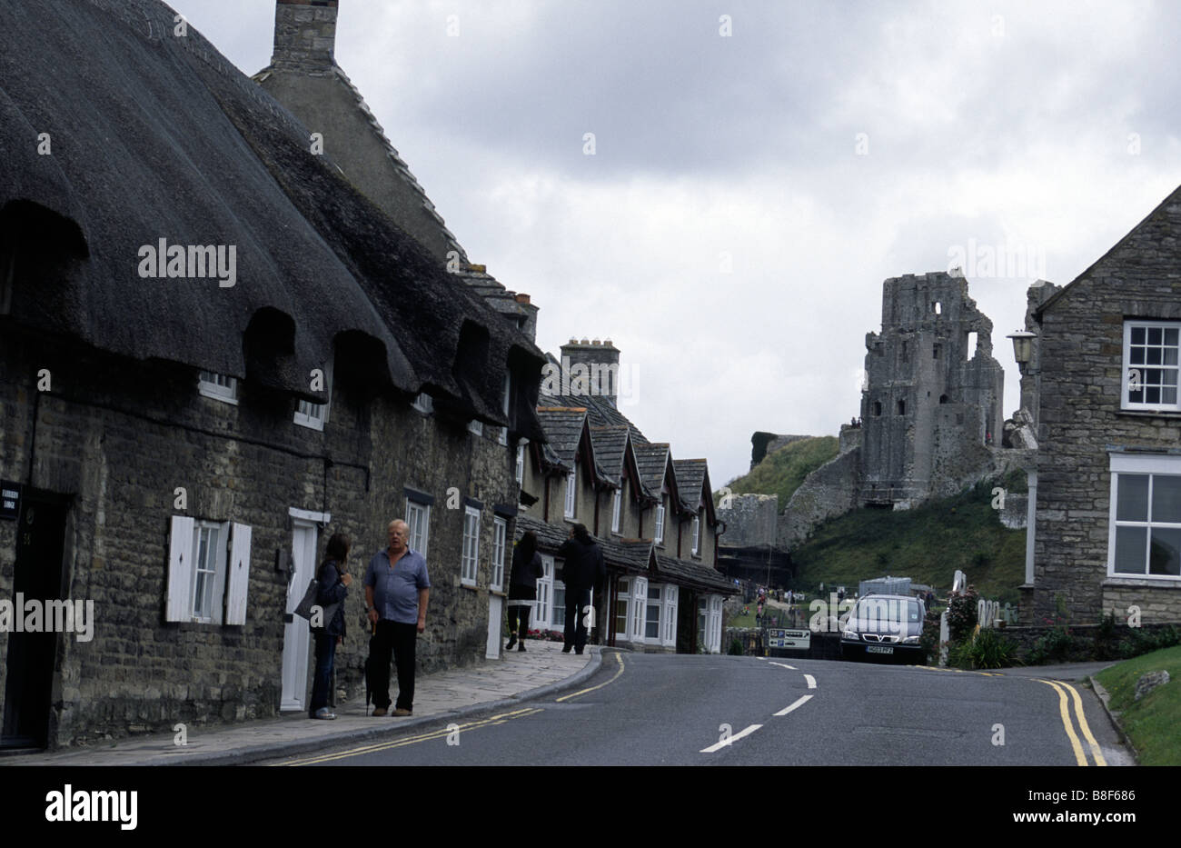 Corfe Castle Village and castle ruins, Dorset, UK Stock Photo