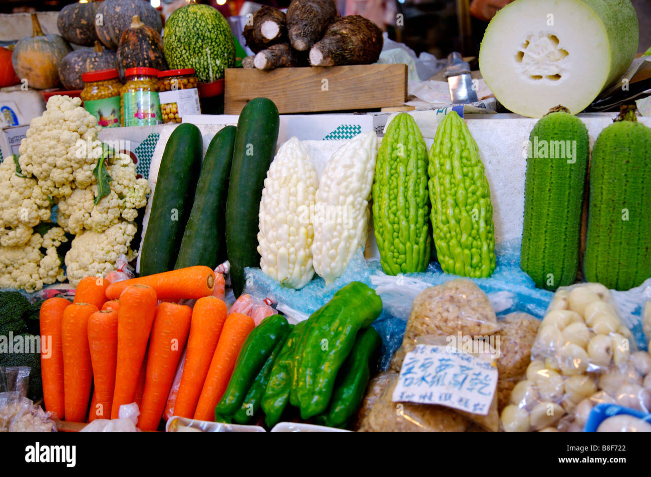 A variety of fresh vegetable son display in a market stall Stock Photo ...