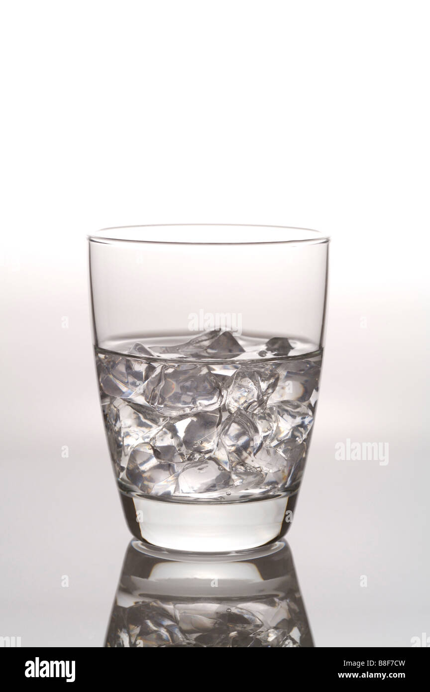 Glass of water with ice cubes still life Stock Photo - Alamy