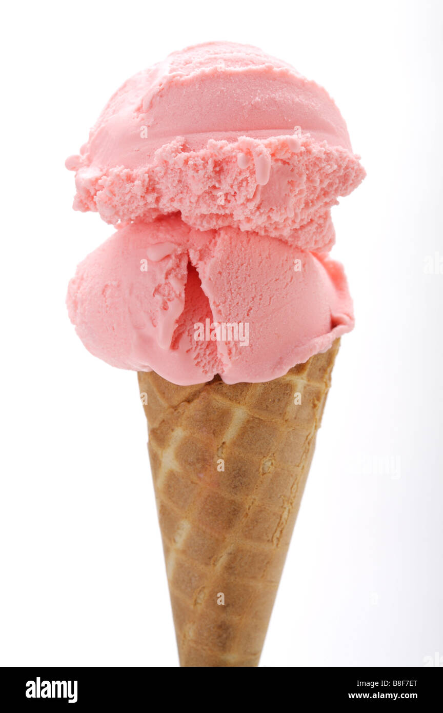 Two scoops of strawberry ice cream on an ice cream cone Stock Photo