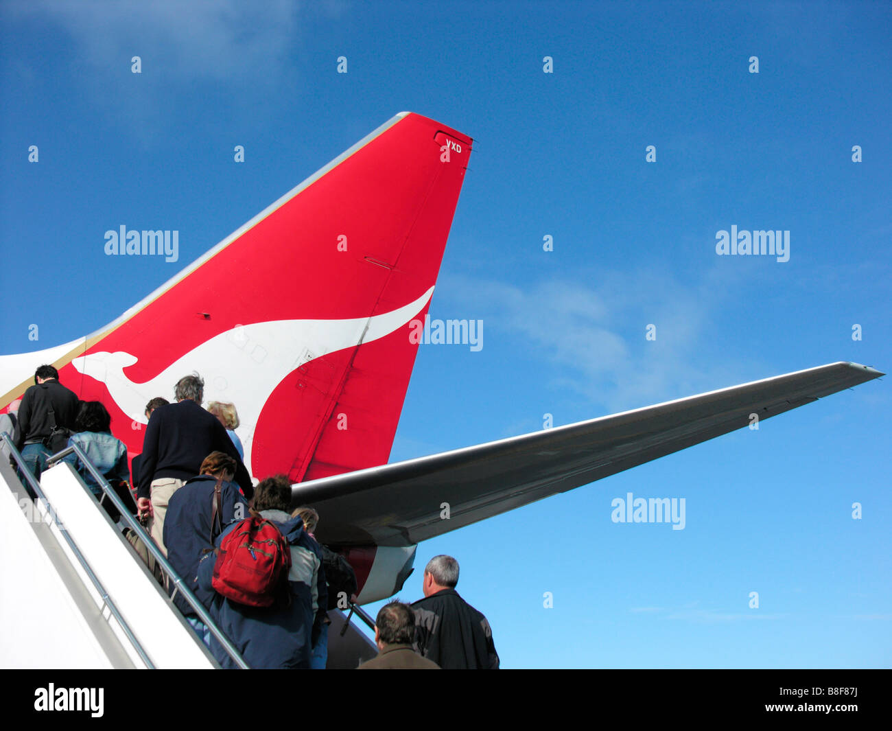 Passengers entering QANTAS plane Stock Photo