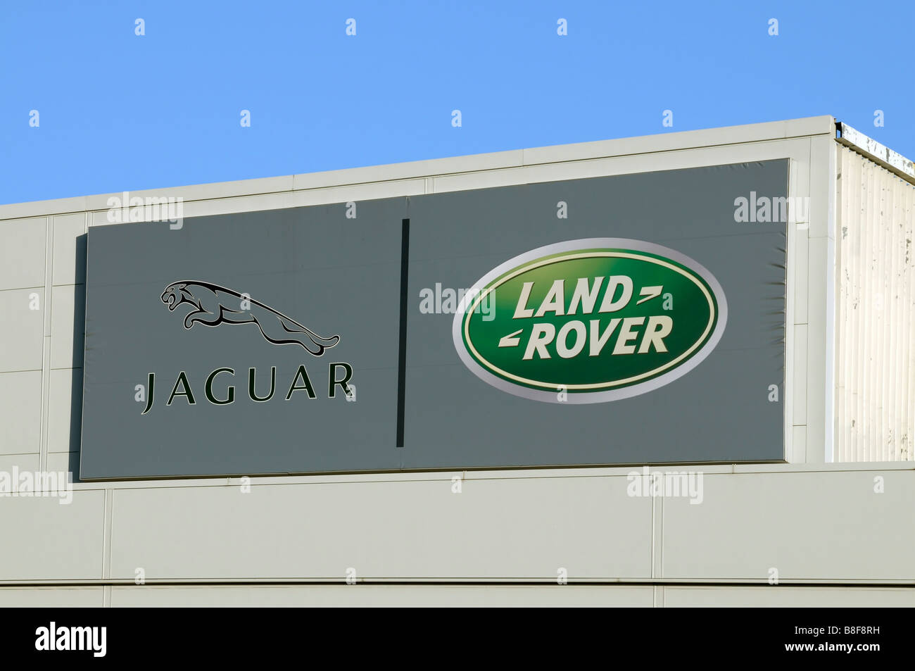Jaguar and Landrover logo's at the Halewood manufacturing plant in Liverpool Stock Photo