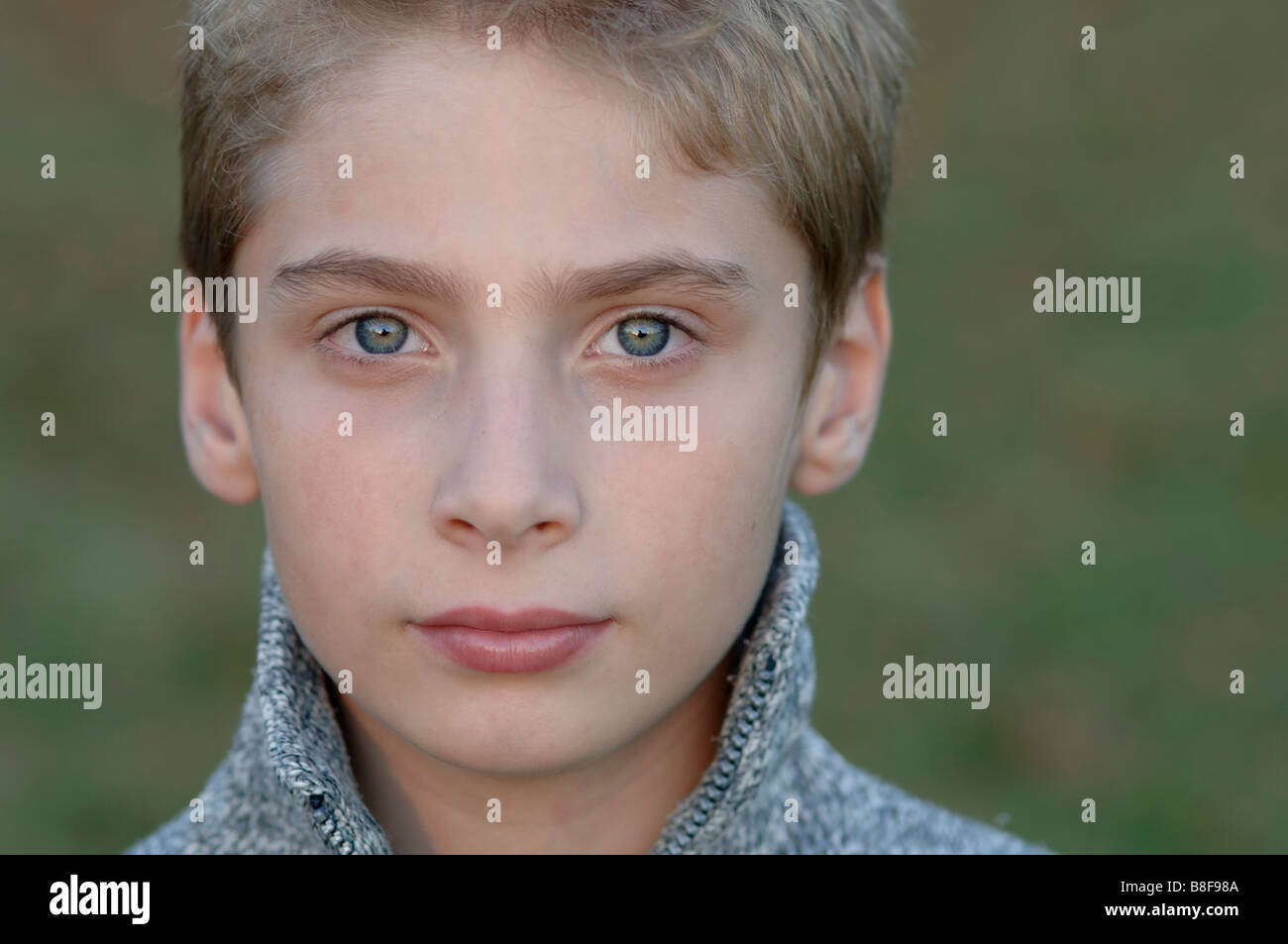 Boy looking at camera Stock Photo - Alamy