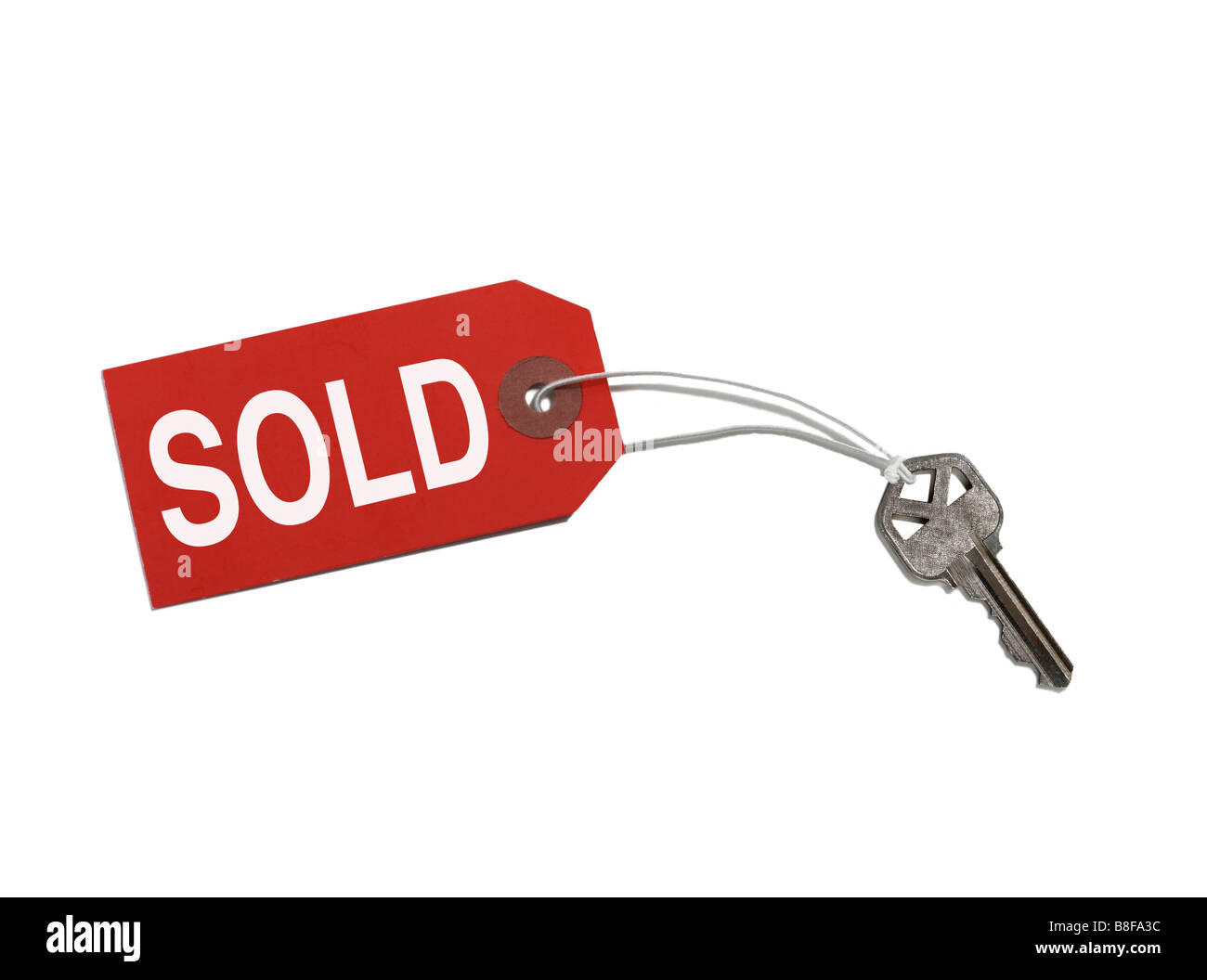 House Key with sold tag attached Stock Photo