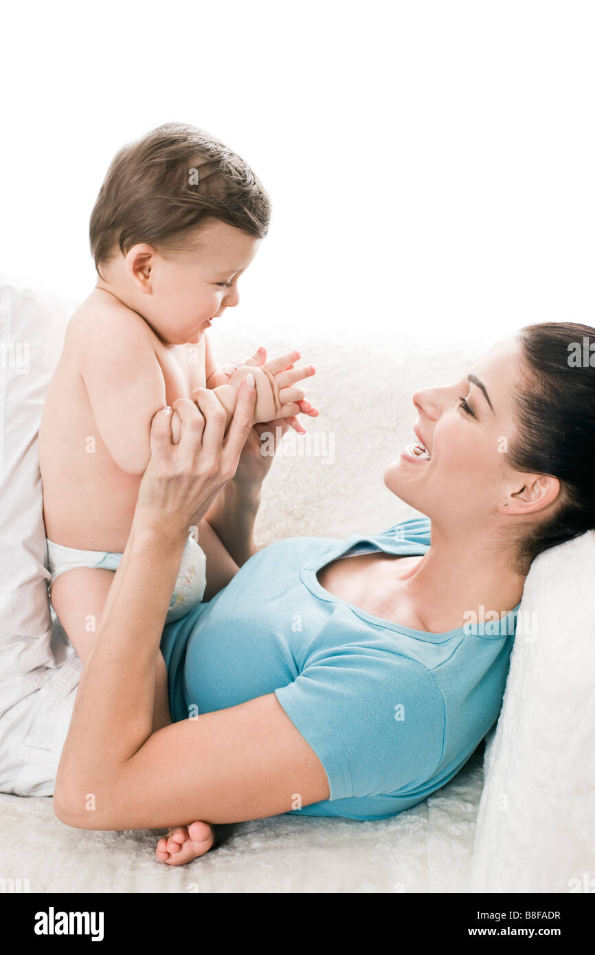mother playing with baby boy Stock Photo