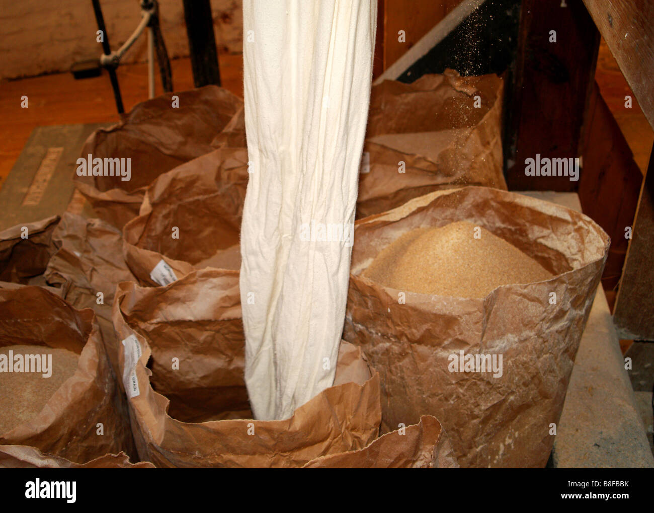 Close up of bags being filled with flour, at Green's Windmill and Science Centre in Nottinghamshire England UK Stock Photo
