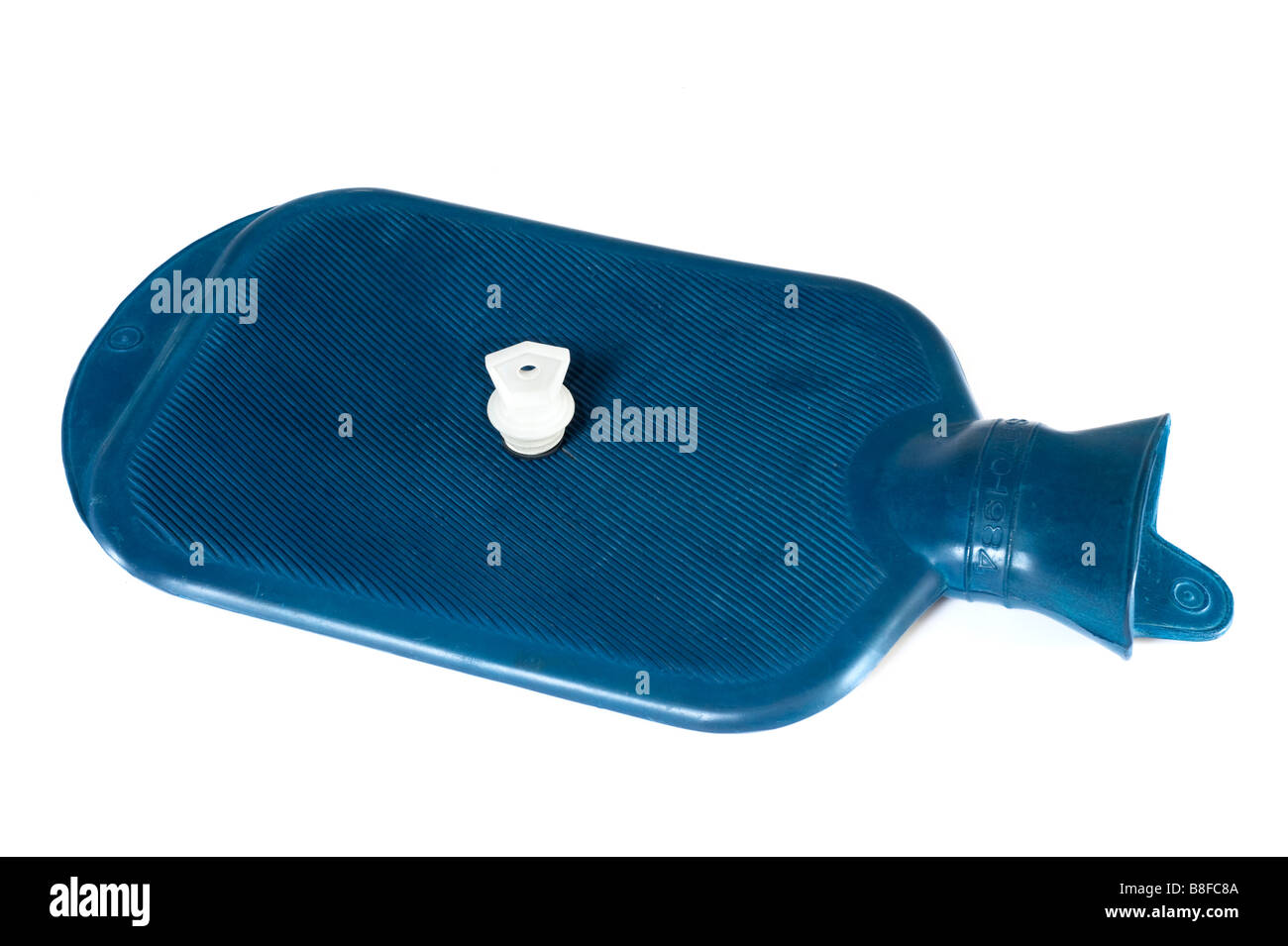 Used blue hot water bottle and white stopper Stock Photo