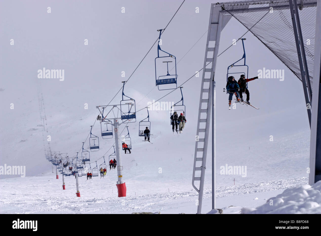 Skiers on ski lift High Tatras Skalnate pleso, Slovakia Stock Photo