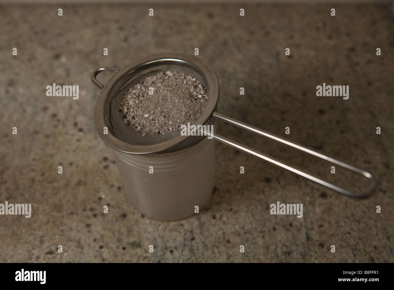 some cremated ashes of a dead person ready to be sprinkled some molten