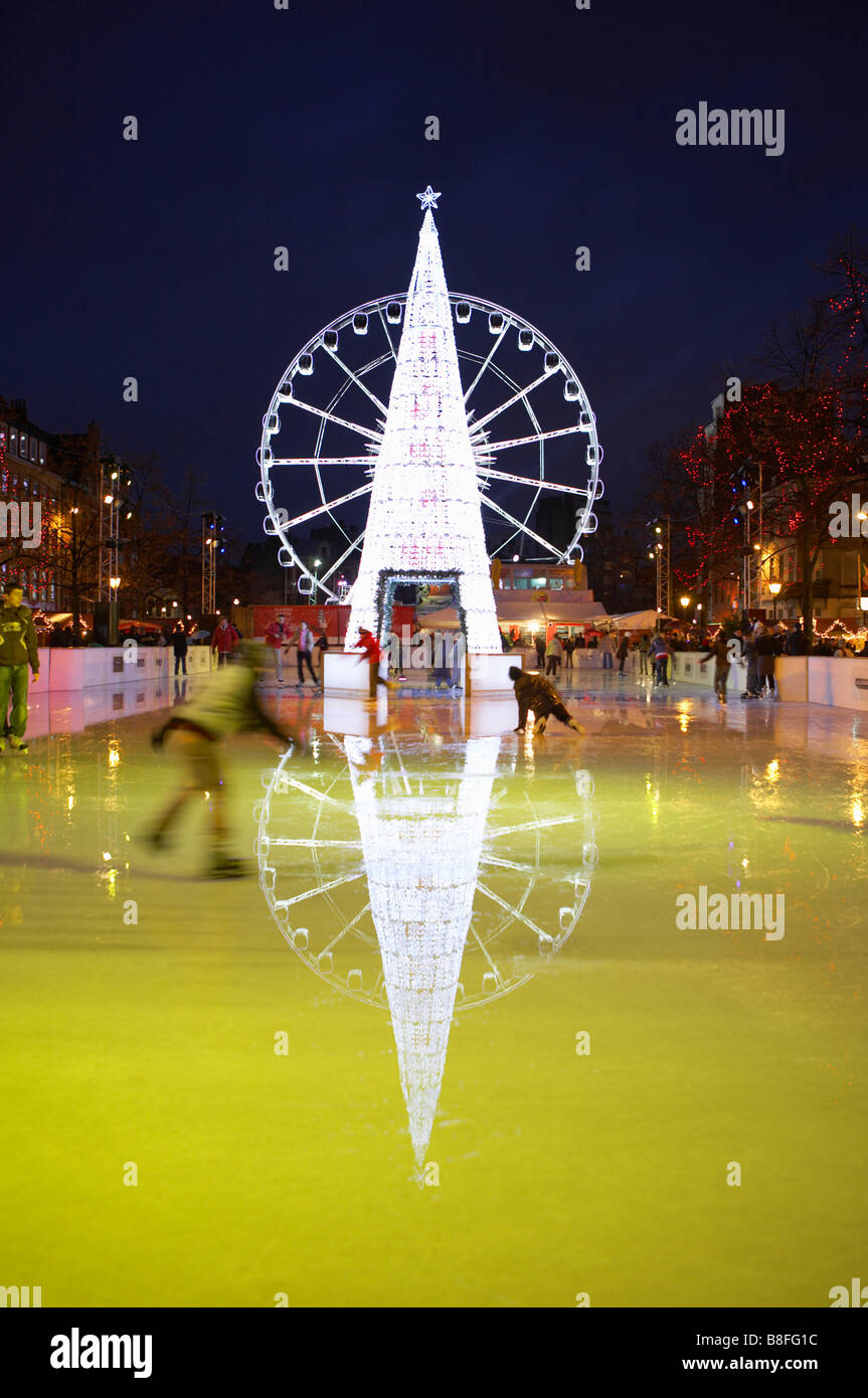 BELGIUM BRUSSELS ICE RINK AT CHRISTMAS MARKET Stock Photo
