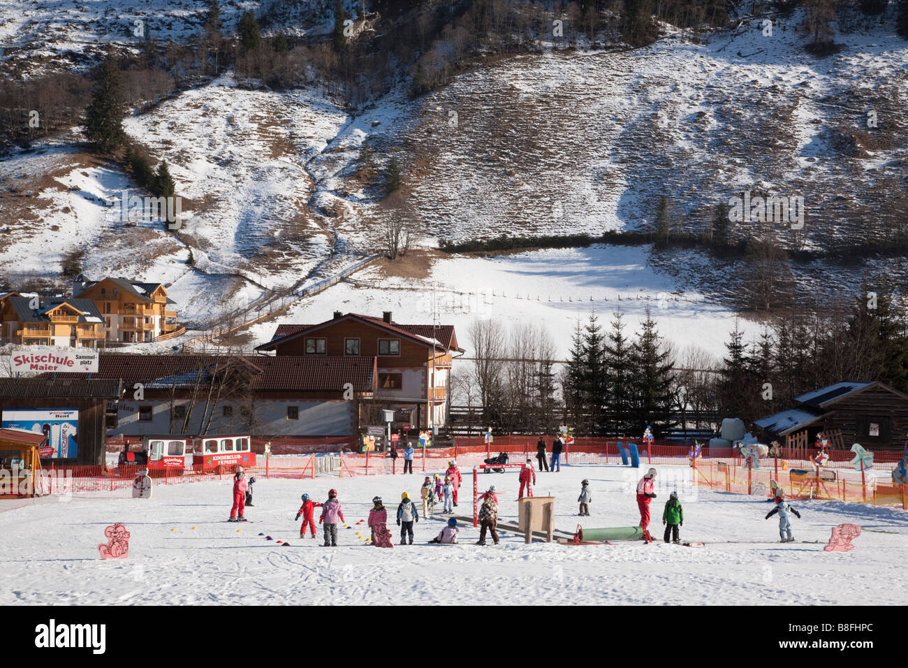 Rauris Austria Europe January Children learning on ski school nursery slopes in Alpine resort in Austrian Alps in winter Stock Photo