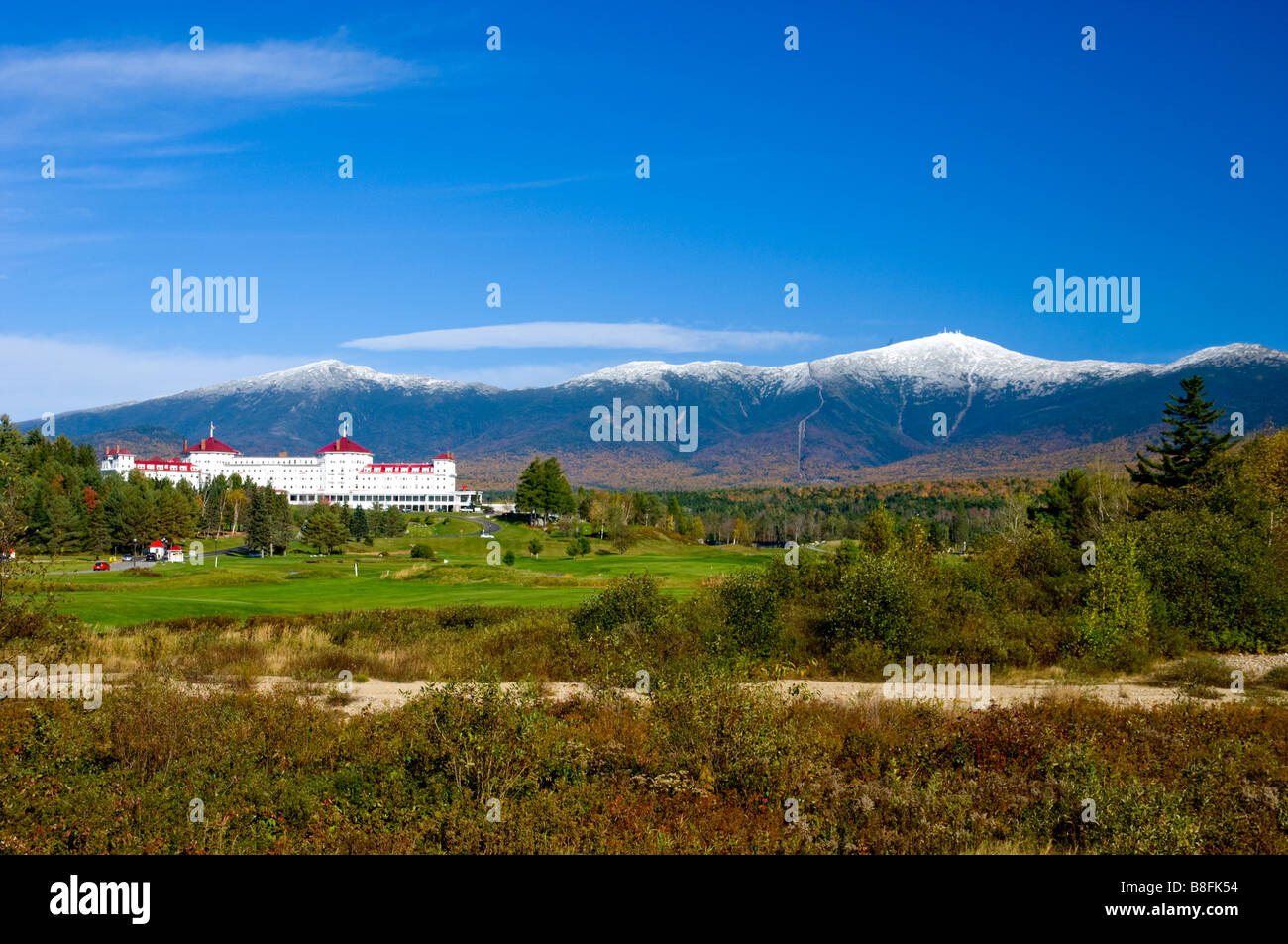 The Mount Washington Resort hotel with snow on Mount Washington in