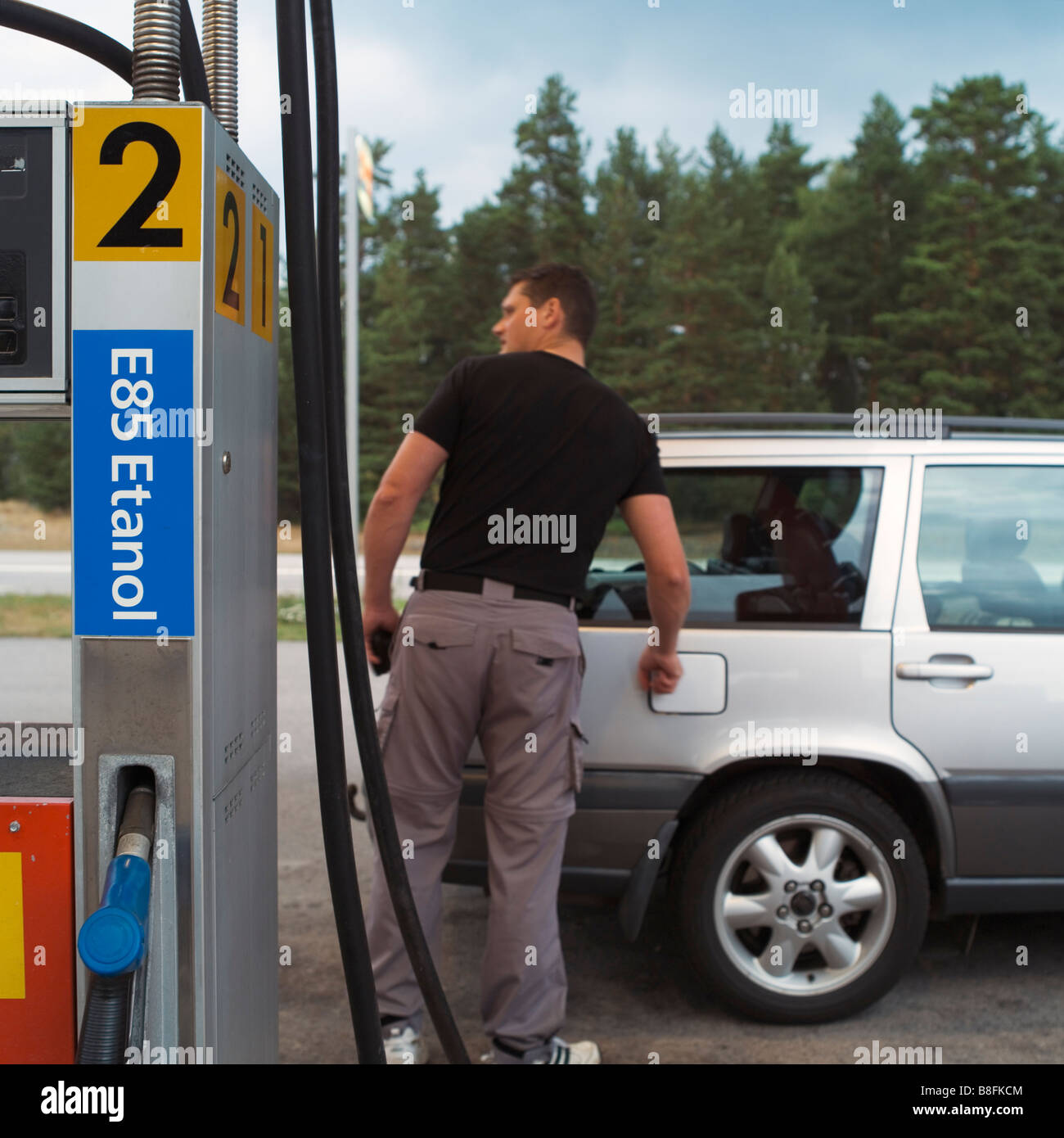 Man filling his Volvo car Stock Photo