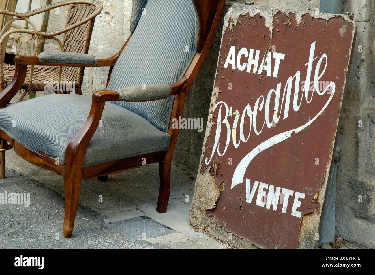 Old Weathered Antiques Sign And Chair Outside A Bric A Brac Shop Stock Photo Alamy