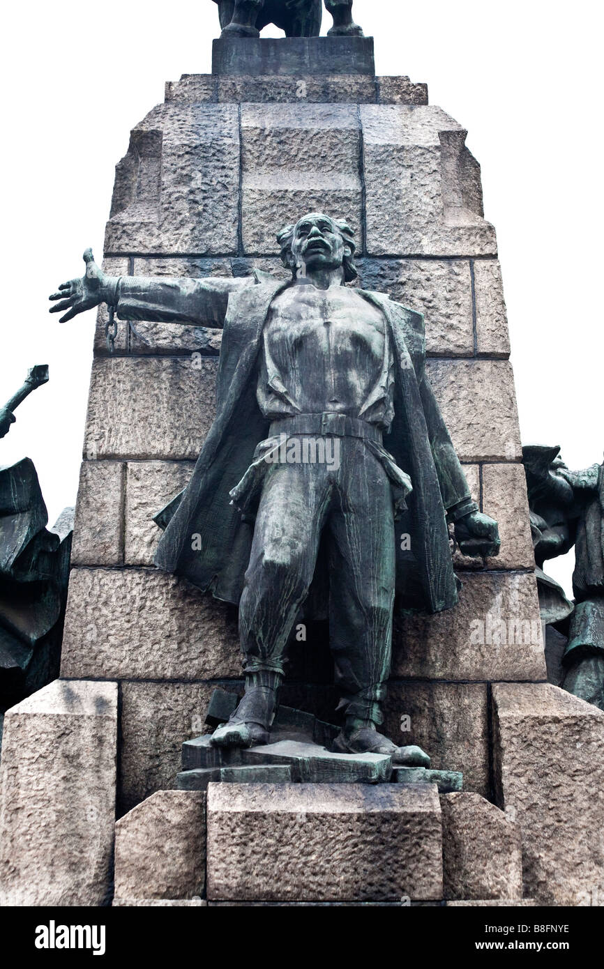 Peasant figure breaking his bonds on north side of Grunwald Monument. Krakow, Poland Stock Photo