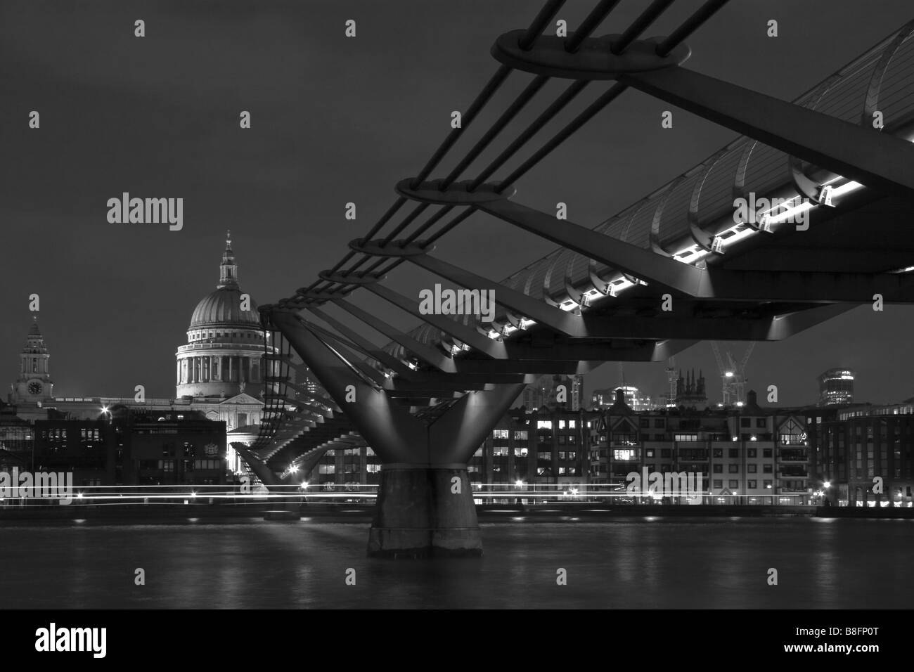 View of St Paul's cathedral at end of Millenium bridge, London, England. South Bank uk Stock Photo