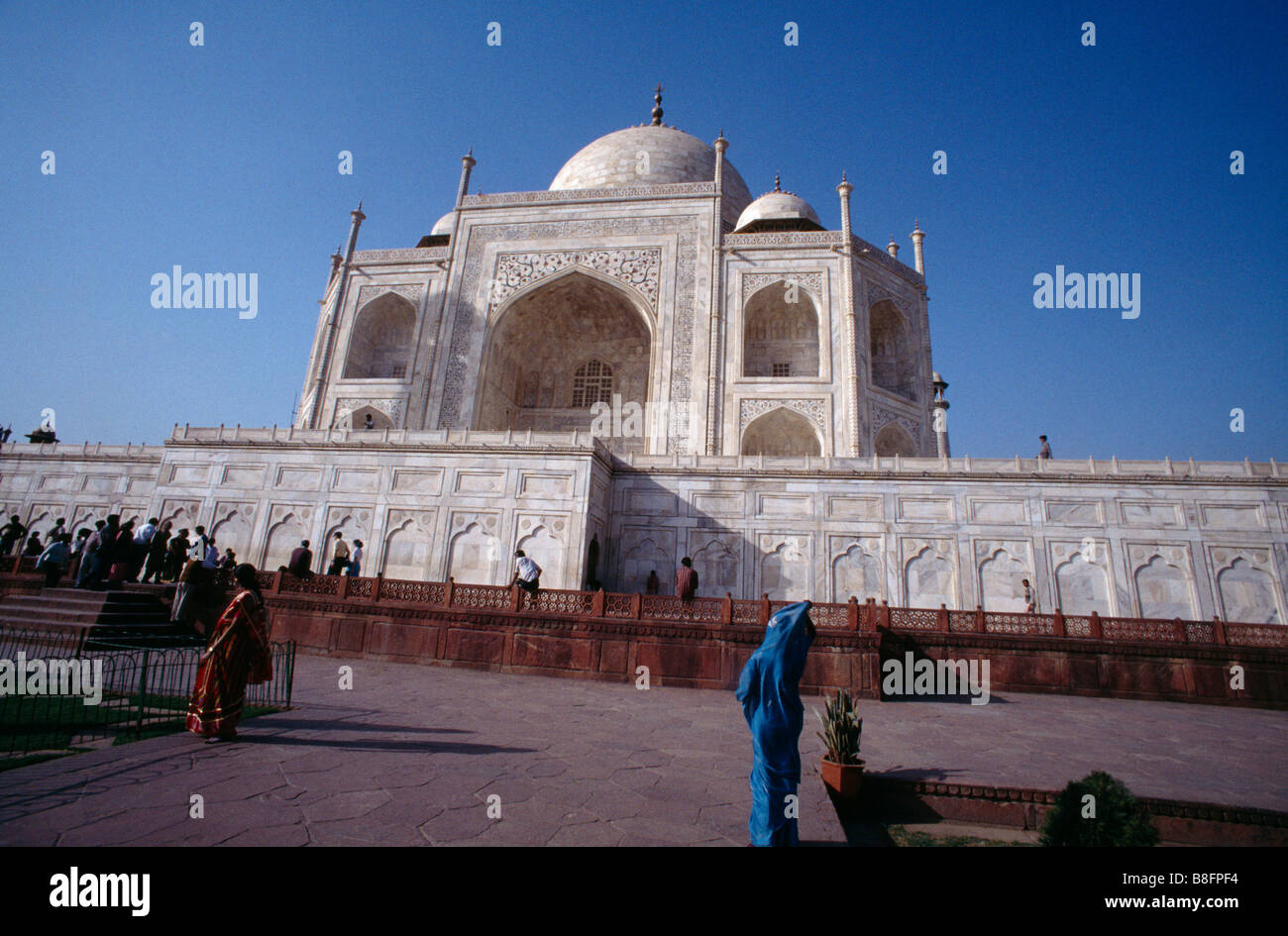Agra India People By The Taj Mahal Stock Photo