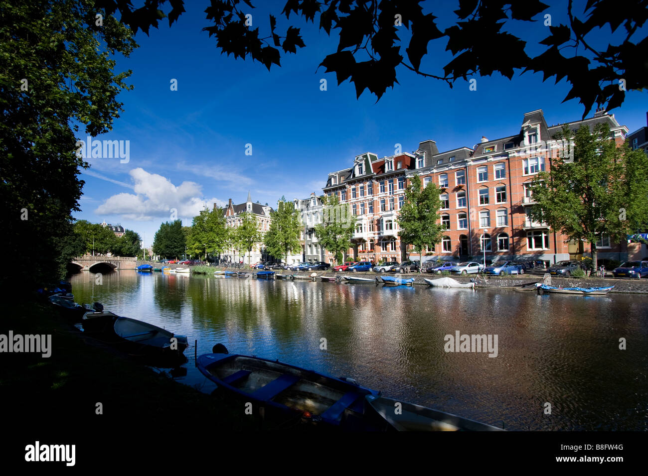 View of a channel and buildings in Amsterdam Netherlands Stock Photo