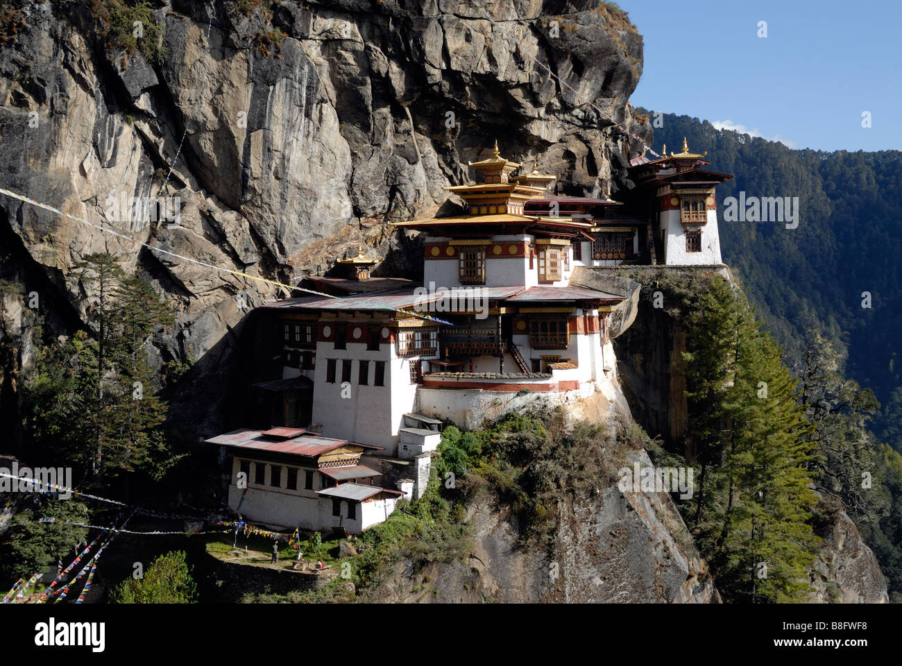 Paro Taktsang Goemba, monastery, know as the  Tigers Nest is perched precariously half way up a mountain side cliff. Stock Photo