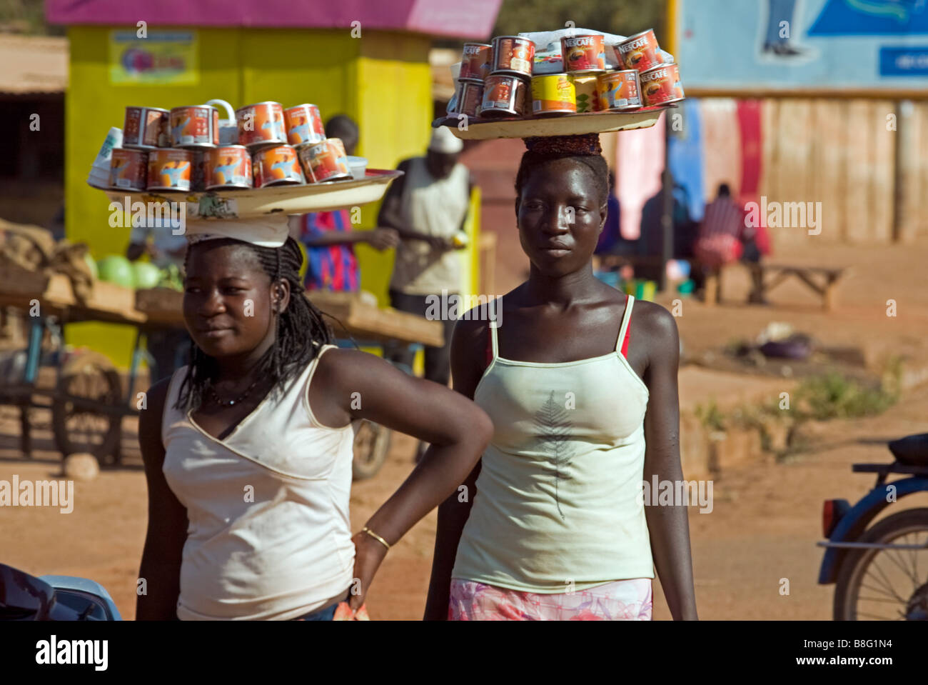 African girls selling coffee Ouagadougou Burkina Faso Stock Photo