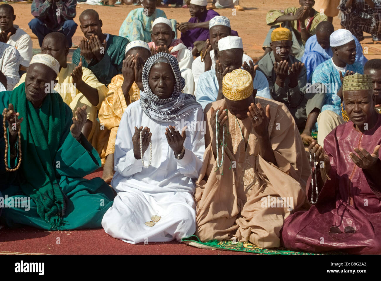 Muslim Africans in a feast of sacrifice pray Ouagadougou Burkina Faso Stock Photo