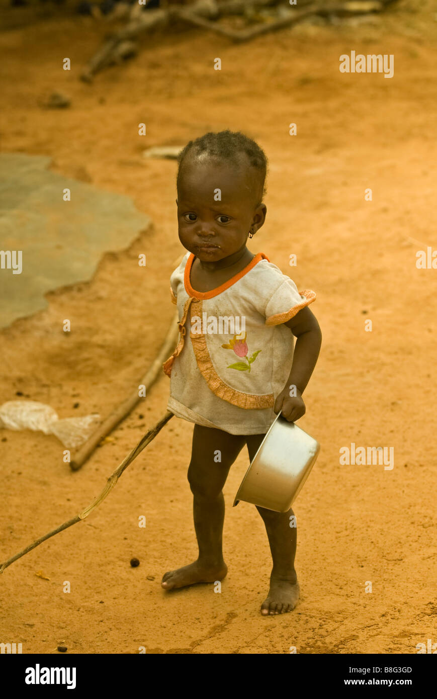 African child with food aid support Ouagadougou Burkina Faso Stock Photo