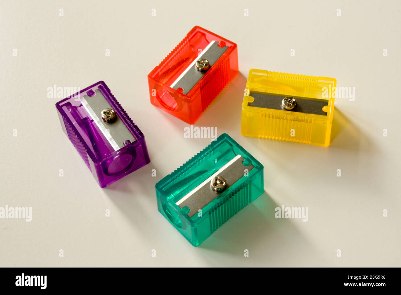Four colourful pencil sharpeners Stock Photo Alamy