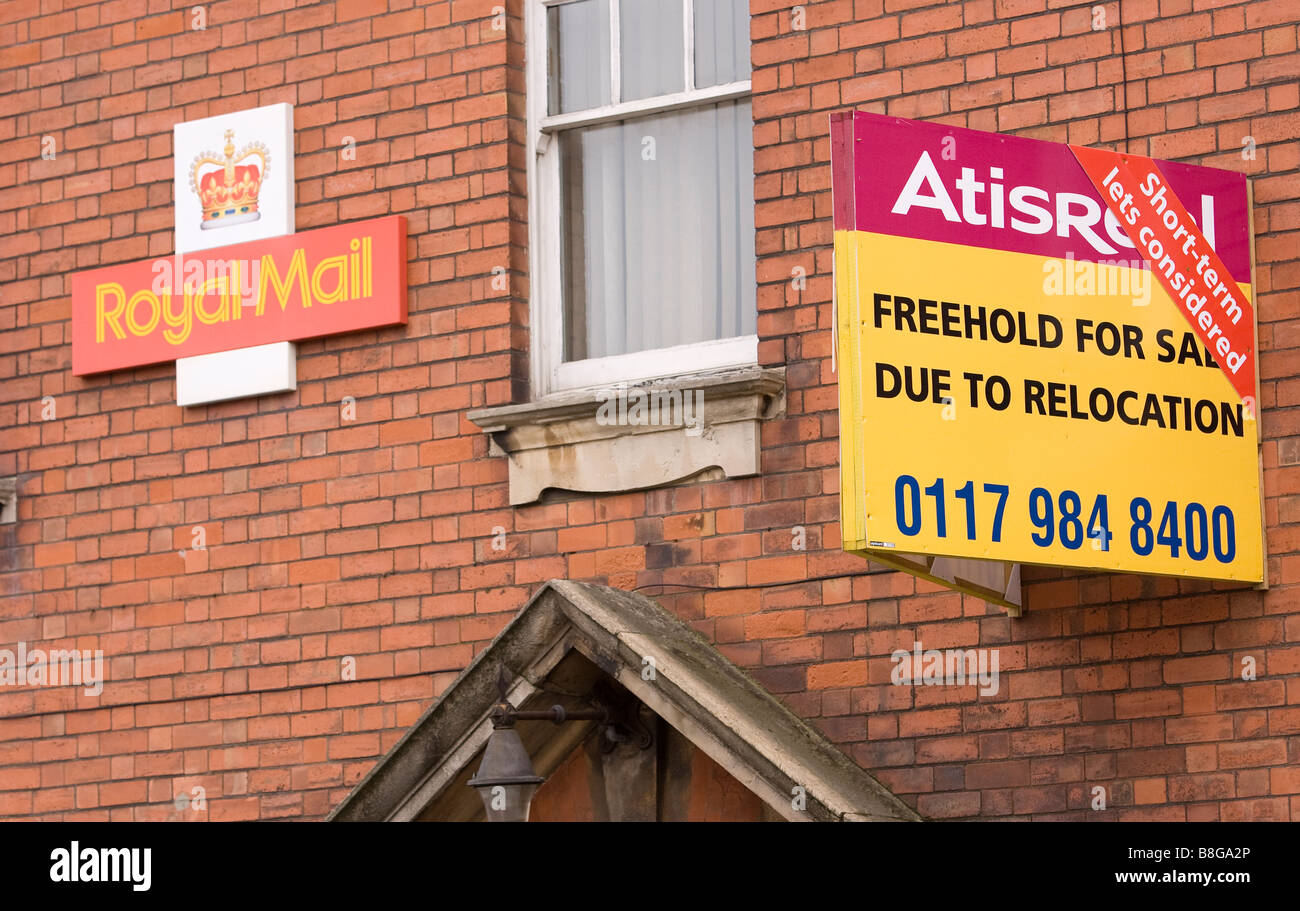 Royal mail property with for sale/lease sign on wall. Stock Photo