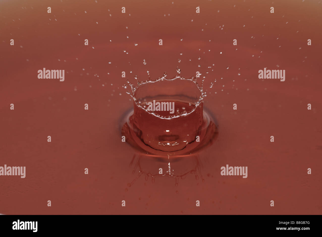 Crown formation from a drop of water Stock Photo - Alamy