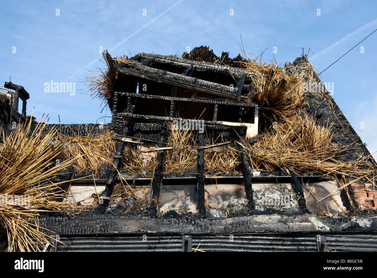 Thatched cottage fire firefighters thatched hires stock photography