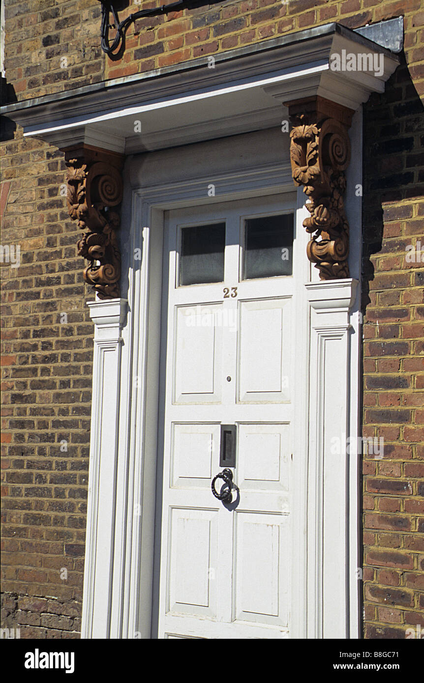 Albury Street, Deptford, London, SE8. Door to No 23, with early C18 carved brackets. Stock Photo