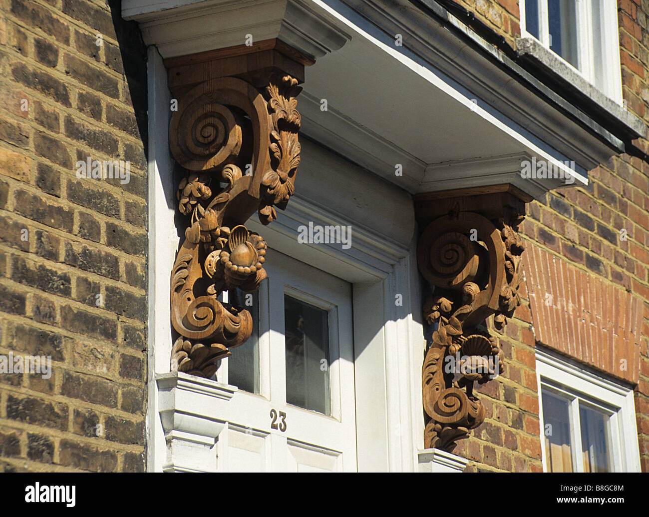 Albury Street, Deptford, London, SE8. Door hood to No 23, with early C18 carved brackets. Stock Photo