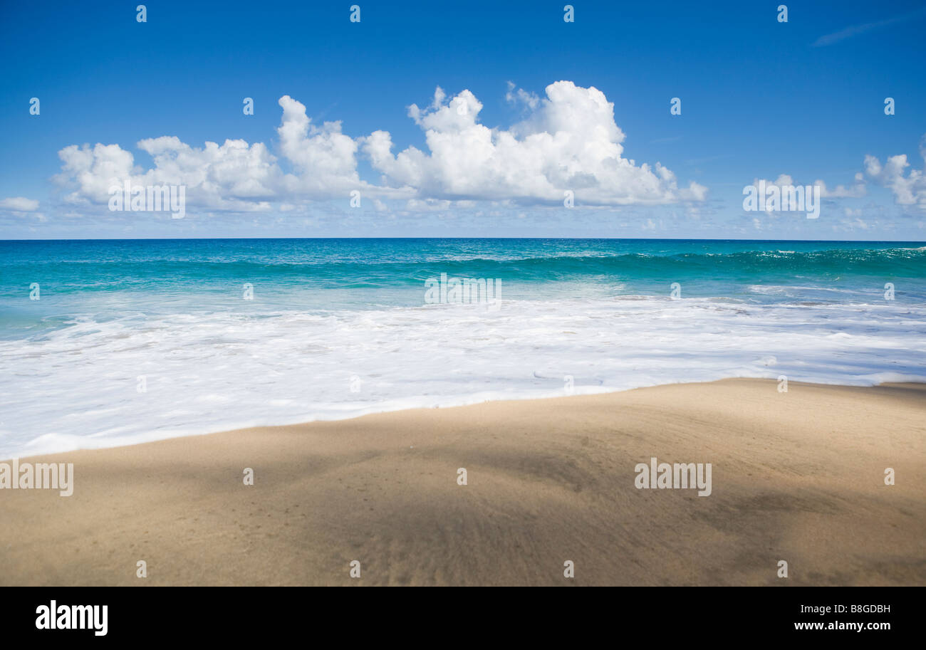 Waves rolling on to Hanakapiai Beach on Northwest Kauai's Na Pali Coast Hawaii, USA Stock Photo