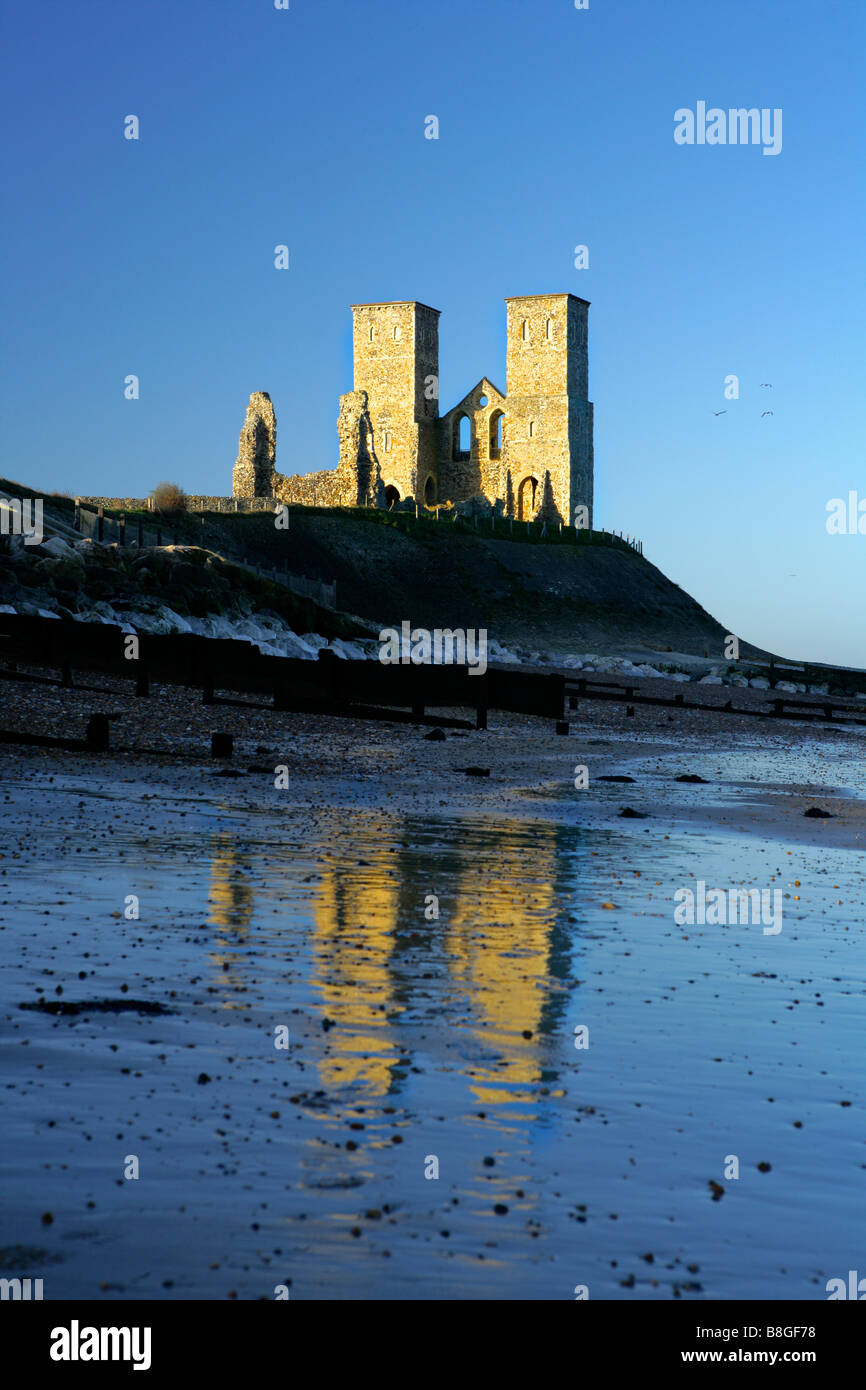 Reculver Towers Kent refected in beach Stock Photo - Alamy